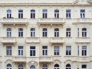 Fototapeta na wymiar windows on the beautiful facade of the old baroque European city