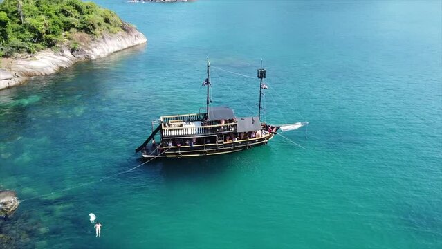Pirate ship set anchor off Coast of Island in Crystal Clear Water in Brazilian Ocean.
Paraty, Brazil By Drone 4k
Aerial Nature + Travel
