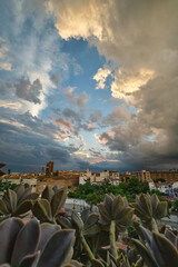 blue sky with clouds over the city