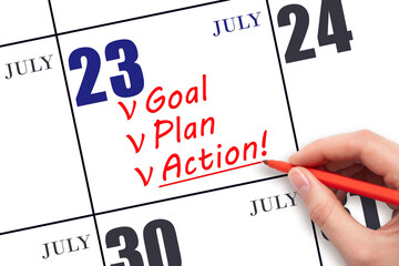 Hand writing text GOAL PLAN ACTION on calendar date July 23. Motivation for a new day. Business...