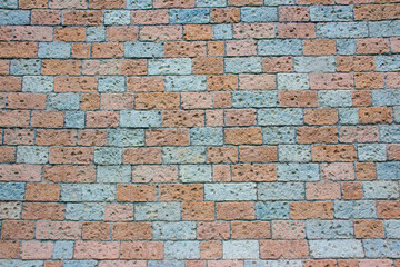 Texture stone wall , briquette color and light blue , stone look background.