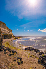 Beautiful and colorful Atlantic coastline in peninsula Valdes near Puerto Madryn with sandstone...