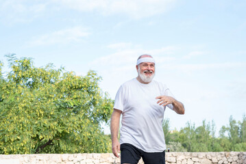 Portrait of active senior man smiling