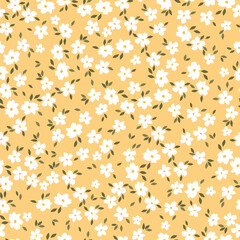 Cute floral pattern. Seamless vector texture. An elegant template for fashionable prints. Print with small white flowers, gold leaves. yellow background.