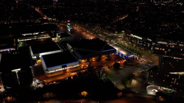 Amsterdam, 27th of October 2022, The Netherlands. Rai Amsterdam confention and exhibition and event center. Dark night time aerial drone overview. Commercial company close to the airport.