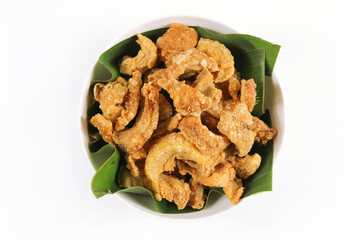 Homemade crispy pork rind isolate on white background. Local food of northern Thailand.