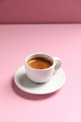 hot cappuccino with latte art on wood background