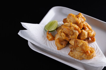 Chicken Karaage Japanese Fried chicken isolated in black background