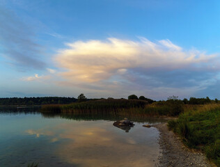 Beautiful clouds in the sky over the quarry . Leningrad region. Vsevolozhsk.