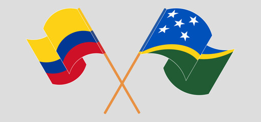Crossed and waving flags of Colombia and Solomon Islands