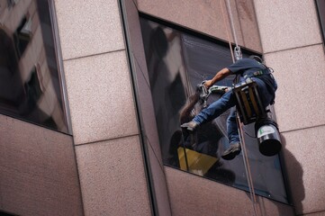 Brad Hines original photo of window washing on building. I am the owner of this photo. 