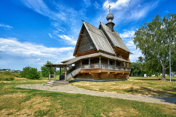Fototapeta na wymiar Old russian wooden church at summer