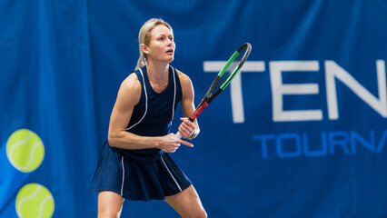 Female Tennis Player Waiting for Ball to Land After Shot During Championship Match. Professional Woman Athlete Successfully Striking Ball. World Sports Tournament. TV Live Broadcast Concept.