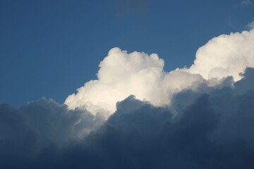 Big clouds close up of white conversion into a rain cloud.
