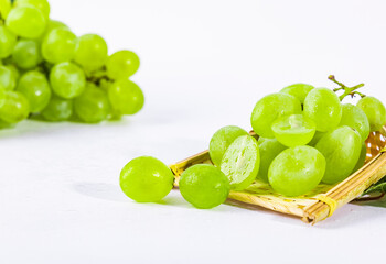 grapes and cheese on a plate