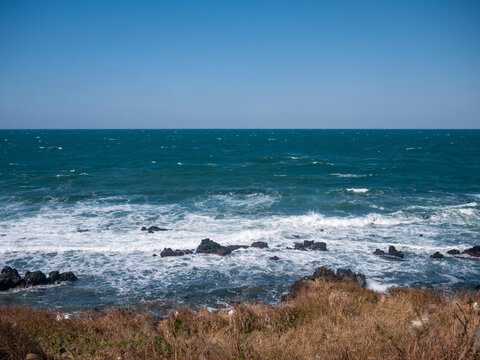 Deep Green Sea Under Blue Sky