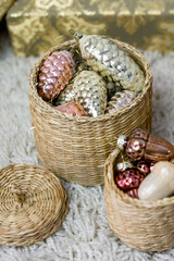 Vintage Christmas glass decorations in round baskets.