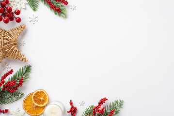New Year concept. Top view photo of spruce branches mistletoe berries candle rattan star dried...