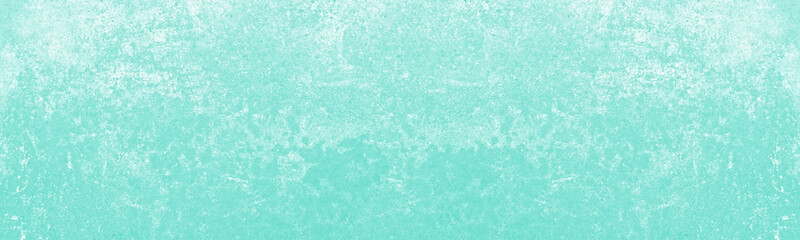 Pastel turquoise color textured surface abstract wide panoramic background. Light teal colour...