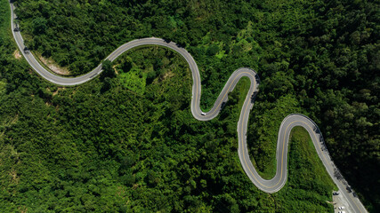 aerial view ROAD No.1081 of winding mountain road between Pua Ddistric, Nan Province, Thailand is...