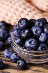 Ripe blueberries in gravy boat