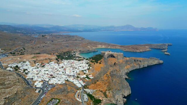 Lindos is a town on the Greek island of Rhodes. It&rsquo;s known for its clifftop acropolis, which features monumental 4th-century gates and reliefs from about 280 B.C.