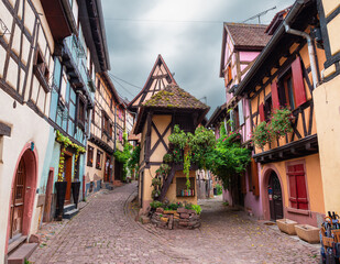 Eguisheim, France - October 12, 2022: Traditional medieval houses in Eguisheim in Alsace along the wine road
