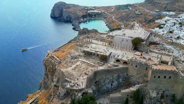 Lindos is a town on the Greek island of Rhodes. It&rsquo;s known for its clifftop acropolis, which features monumental 4th-century gates and reliefs from about 280 B.C.