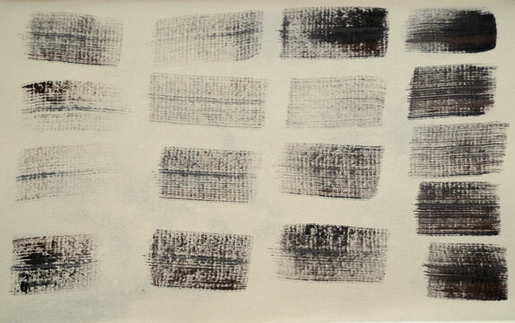 Abstract art. Closeup view of black rectangles with different textures, drawn in paper.
