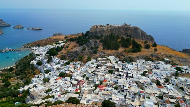 Lindos is a town on the Greek island of Rhodes. It&rsquo;s known for its clifftop acropolis, which features monumental 4th-century gates and reliefs from about 280 B.C.