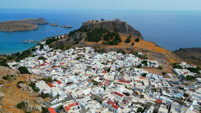 Lindos is a town on the Greek island of Rhodes. It&rsquo;s known for its clifftop acropolis, which features monumental 4th-century gates and reliefs from about 280 B.C.