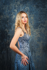 Fototapeta premium The party of a beautiful girl on a black background.