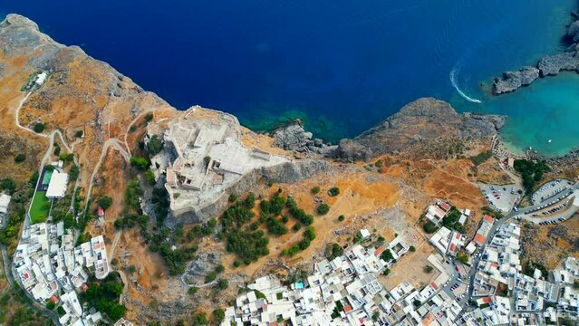 Lindos is a town on the Greek island of Rhodes. It&rsquo;s known for its clifftop acropolis, which features monumental 4th-century gates and reliefs from about 280 B.C.