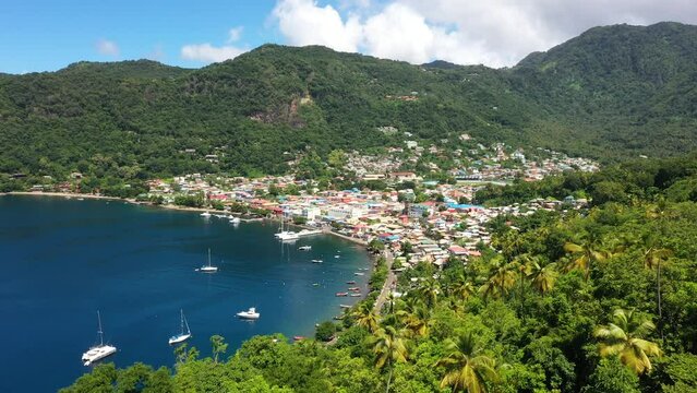Soufriere, Saint Lucia - 10-16-2022: Drone push-in video clip over the Soufriere village.