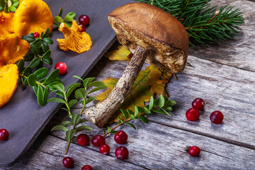 Raw wild mushrooms chanterelles on old wooden background. Vegetarian healthy product. Healthy lifestyle. - 544668133