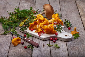 Raw wild mushrooms chanterelles on old wooden background. Vegetarian healthy product. Healthy lifestyle. - 544668155