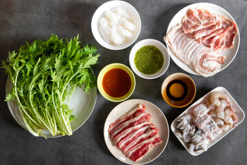 Hot pot set seafood, meat sliced, shirataki noodles with mizuna  vegetable. Delicious shabu at...