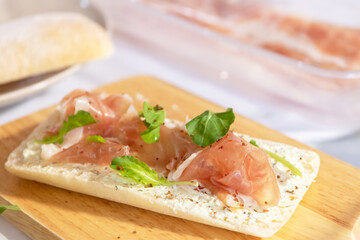 Parma ham and rocket ciabatta (Italian bread) with cream cheese.