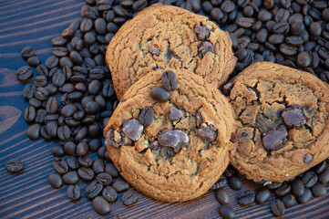 Coffee flavored cookies on a wooden background.