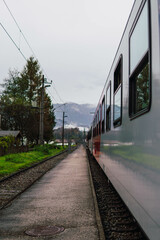Naklejka na ściany i meble view from the train window to the landscapes of austria