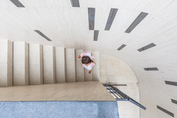 Business woman go up the stairs Success concept