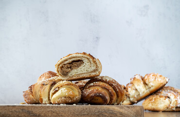 Fresh traditional polish pastry with poppy-seed filling and nuts. St. Martin's croissant, Rogal marciński or świętomarciński. Composition with copy space. - obrazy, fototapety, plakaty