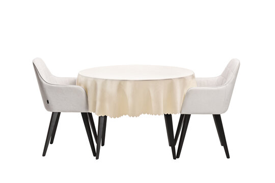 Round Table With A Cloth And Two Chairs