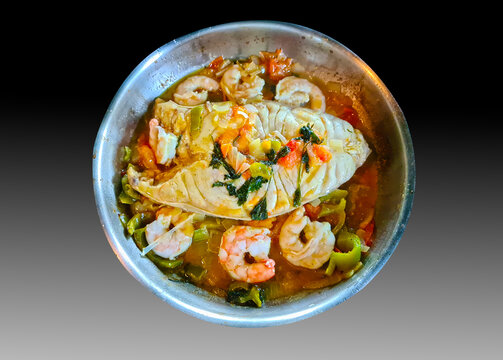 Moqueca, a traditional Brazilian dish with badejo fish and large shrimp, Badejo