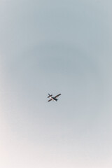 Plane flying by in a clear sky.