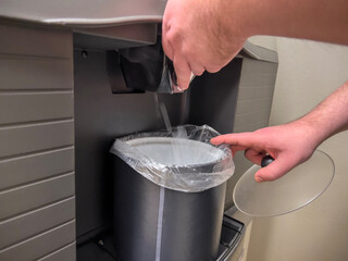 Selective focus, close up view of an ice machine inside a hotel
