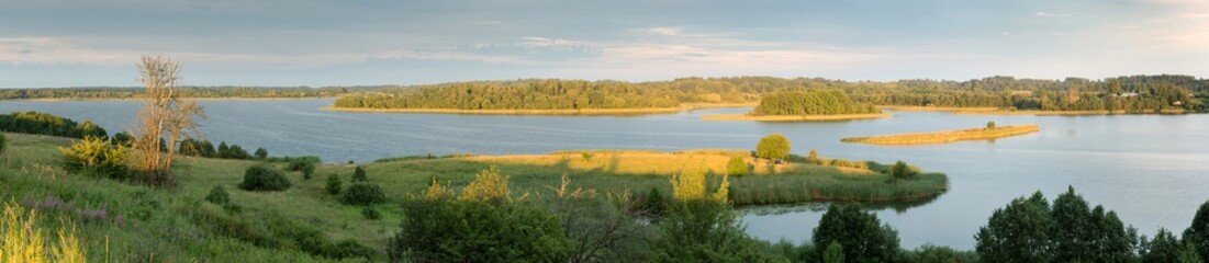 Serene landscape with a lake lake in the evening