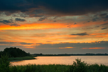 Serene landscape with a lake lake in the evening