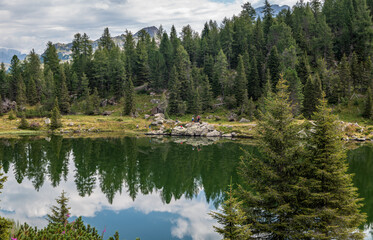 the Colbricon lakes in summer with the mountain reflected on the water - Lagorai chain, Trento province,Trentino Alto Adige, northern Italy - Europe -