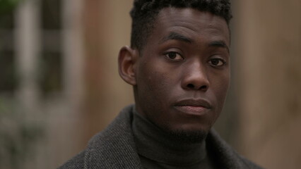 African man close-up face looking at camera